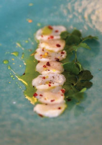 Carpaccio of Scallops with Chilli, Lemon, and Wood Sorrel Recipe by Chef Darina Allen of Ballymaloe Cookery School in Shannagary, Co. Cork. From The New Irish Table: Recipes from Ireland's Top Chefs